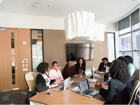Colleagues collaborating around a conference table